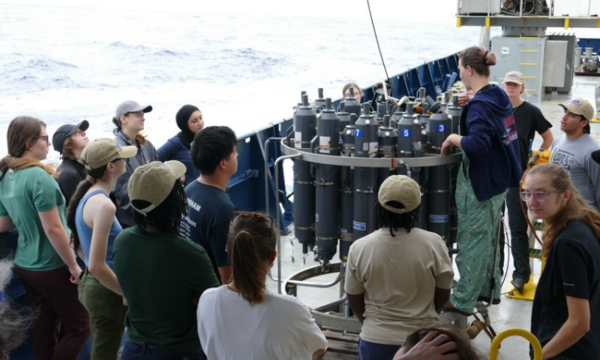 Group of ChOP participants gathered around a CTD carousel.
