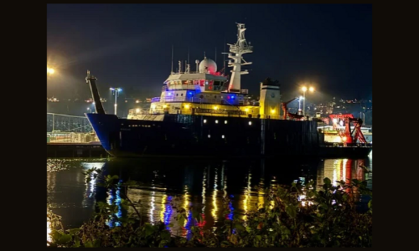 R/V Sikuliaq at the pier at night