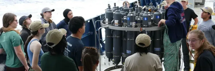 Group of ChOP participants gathered around a CTD carousel. 