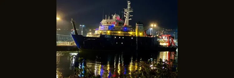 R/V Sikuliaq at the pier at night