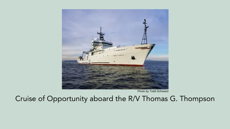 Picture of the R/V Thompson on the open ocean with a blue sky behind it. 