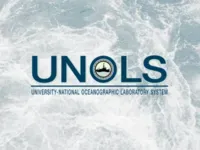 UNOLS Logo on gray sea surface. 