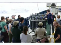 Group of ChOP participants gathered around a CTD carousel. 